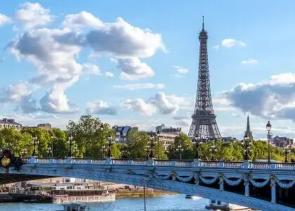 View of the Eiffel Tower from the Alexandre III bridge in Paris, France