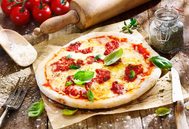 Traditional Neapolitan pizza has simple ingredients and a moist dough.