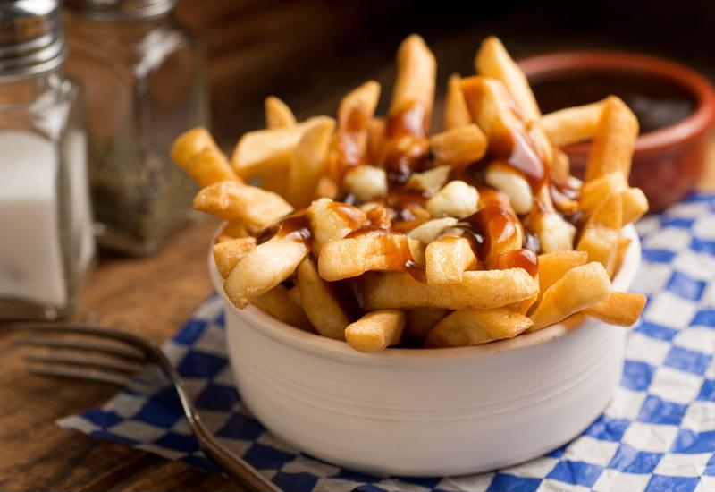 Poutine is one snack that has inspired creative variations from American chefs.