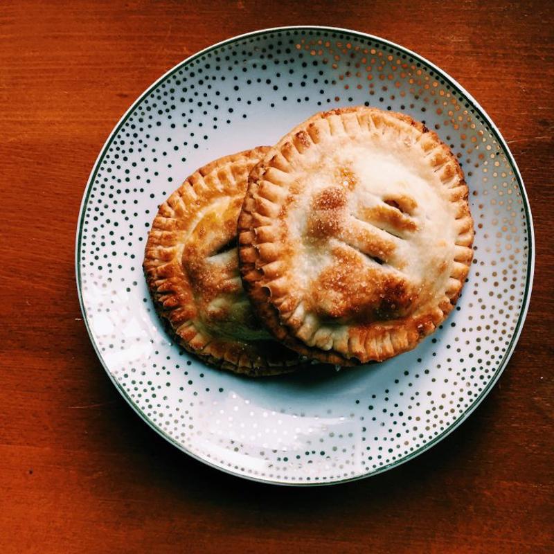 Fried hand pies on a plate.