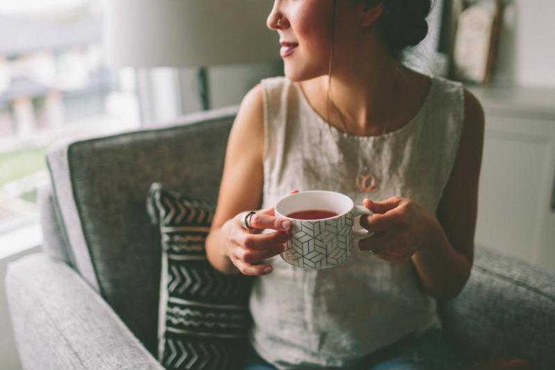 Woman drinking tea.