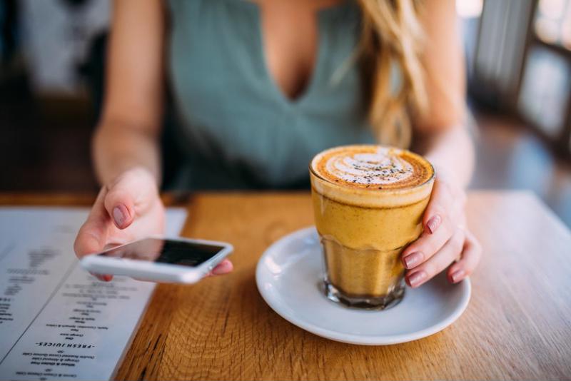 Turmeric latte on cafe table