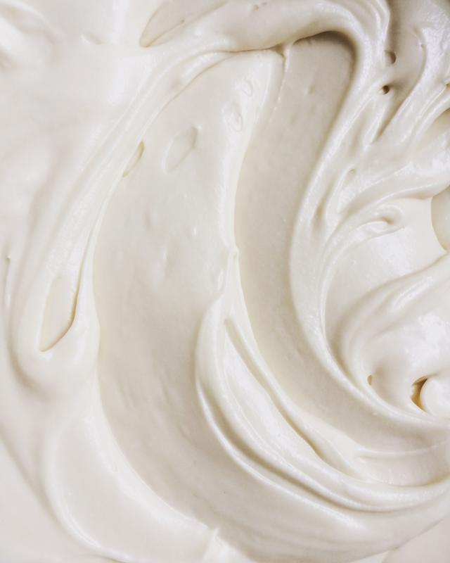 A close-up view of white frosting.